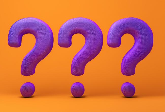 Three purple question marks on an orange background.